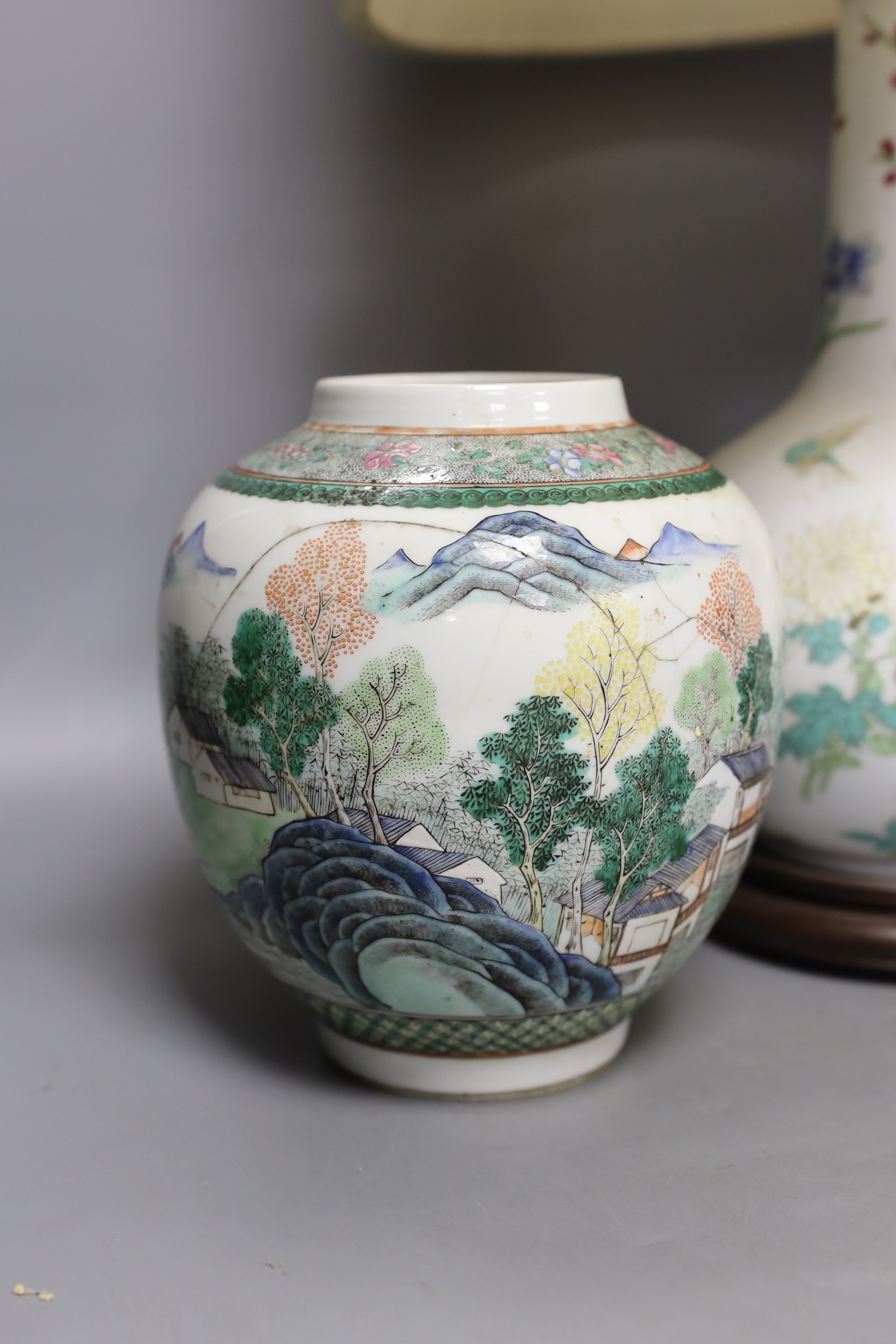 A Chinese table lamp, two Chinese Republic period enamelled porcelain jars, tallest 18.5 cm two brass lion dogs, lamp base 43 cm high (not including light fitting.)